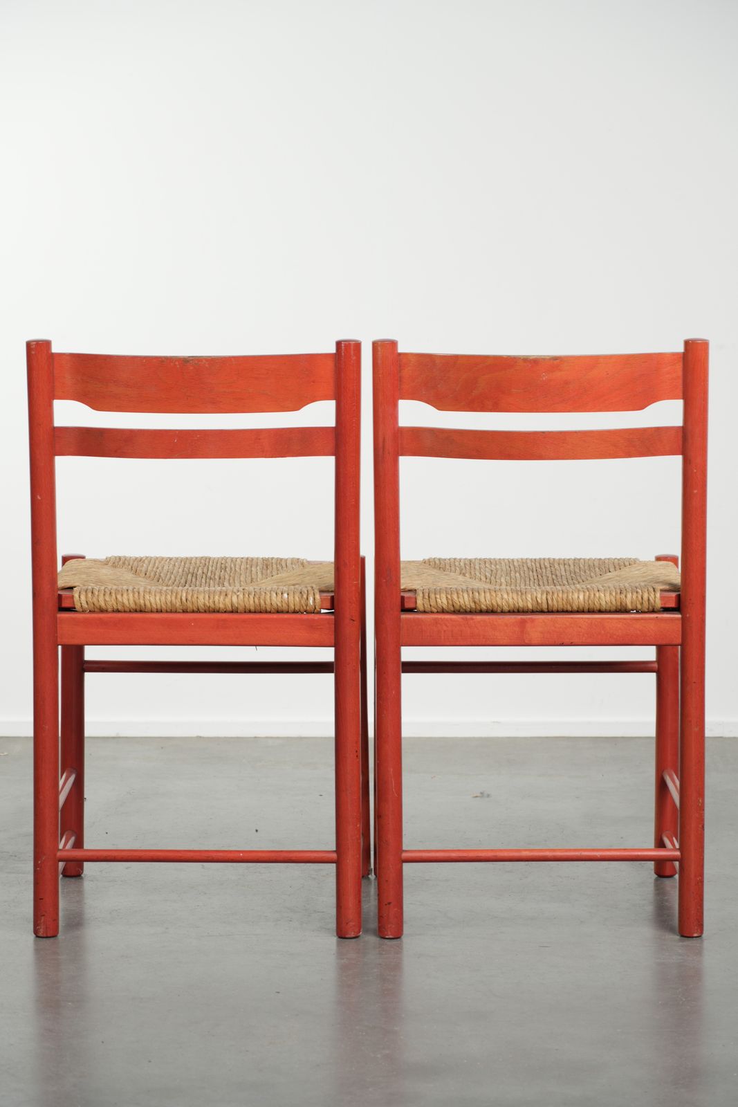 Set Of Two Nice Red Vintage Wooden Chairs From The 70s With A Woven Cane Seat photo for sale