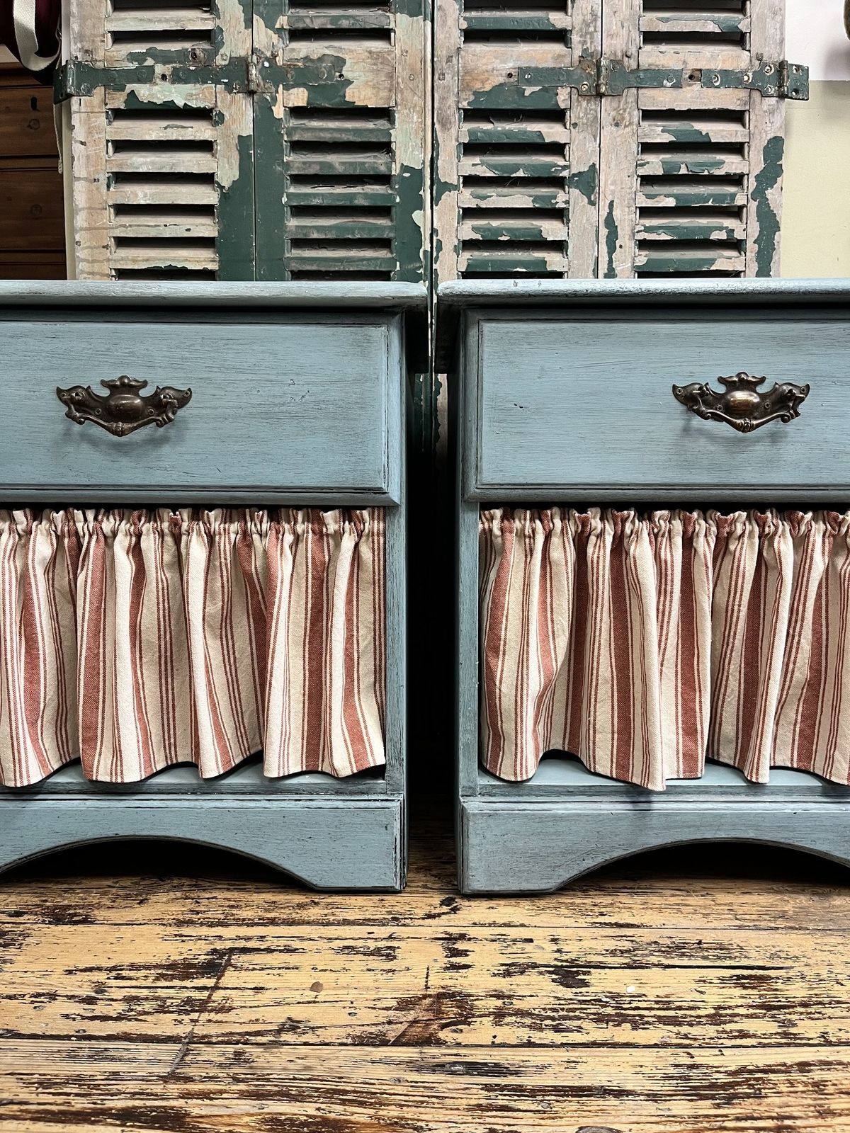 Pair Of Blue Bedside Tables With Striped Cafe Curtains photo 525.0