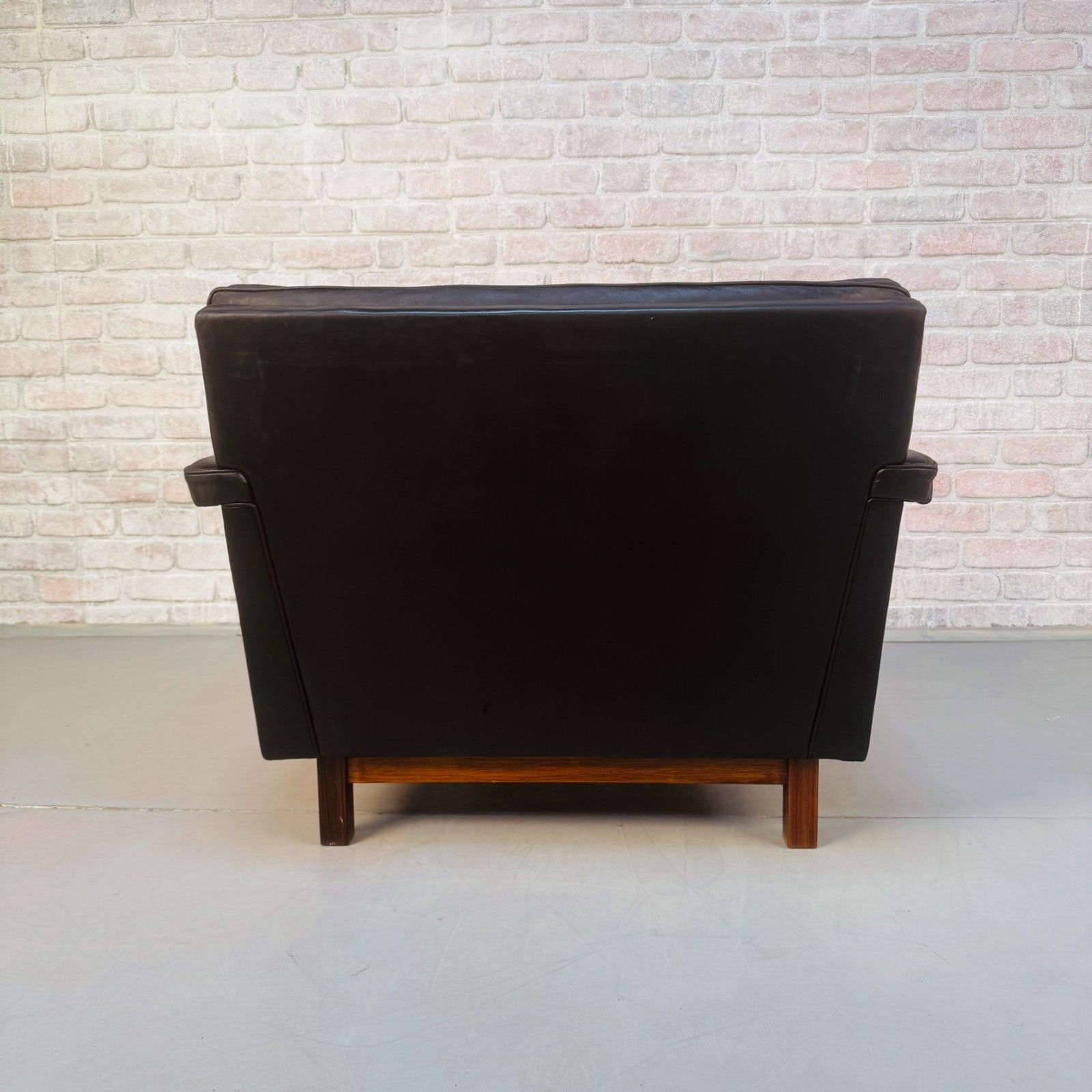 photo for sale Vintage 1960s Swedish Black Leather Armchair – Rosewood Base