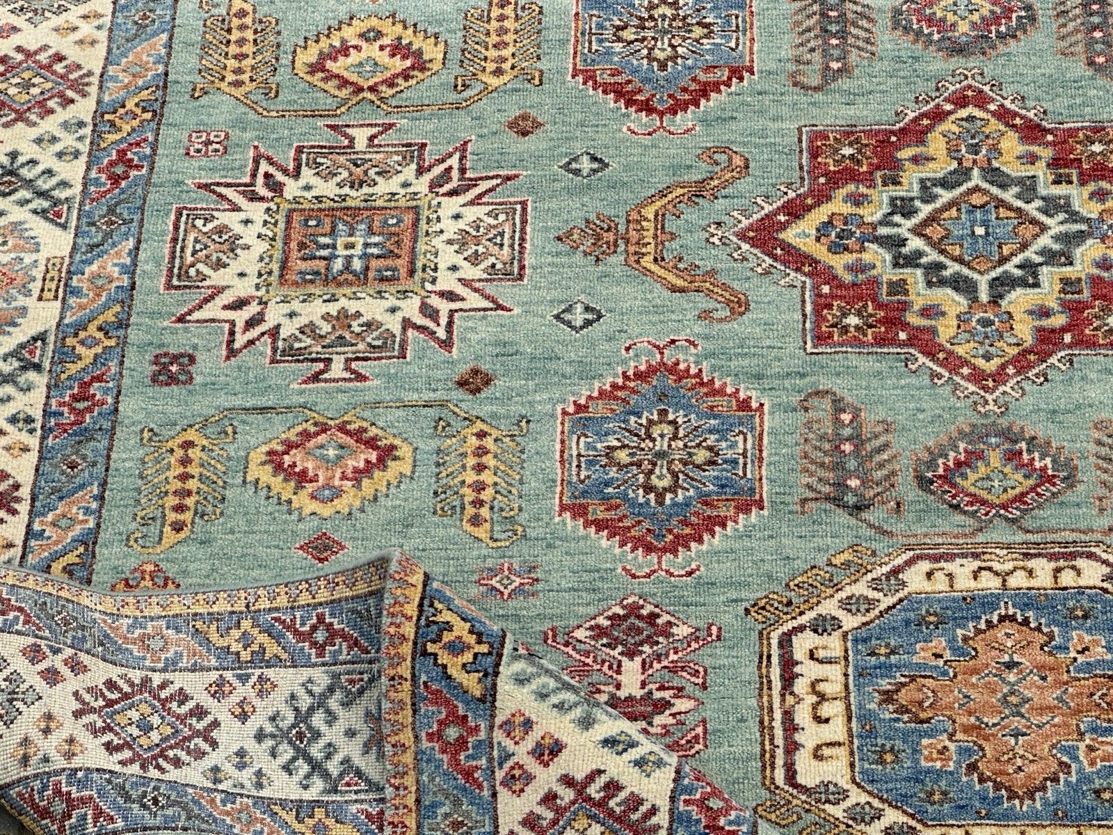 Handgeknoopt wollen vloerkleed 245 x 305 cm, turquoise geometrisch patroon photo buy
