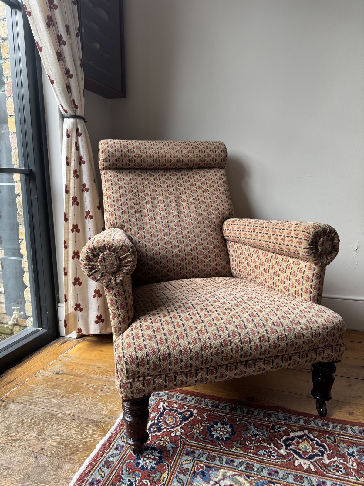 Antique Reupholstered Armchair On Mahogany Casters