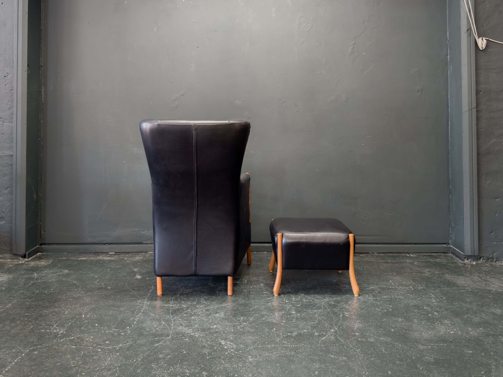 'Claudia' Black Leather And Beech Highback Armchair With Footstool By Stouby photo Furniture