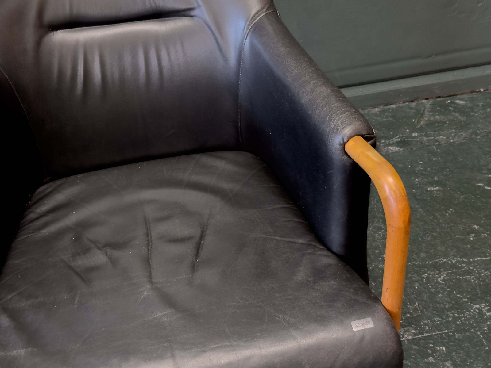 photo buy 'Claudia' Black Leather And Beech Highback Armchair With Footstool By Stouby