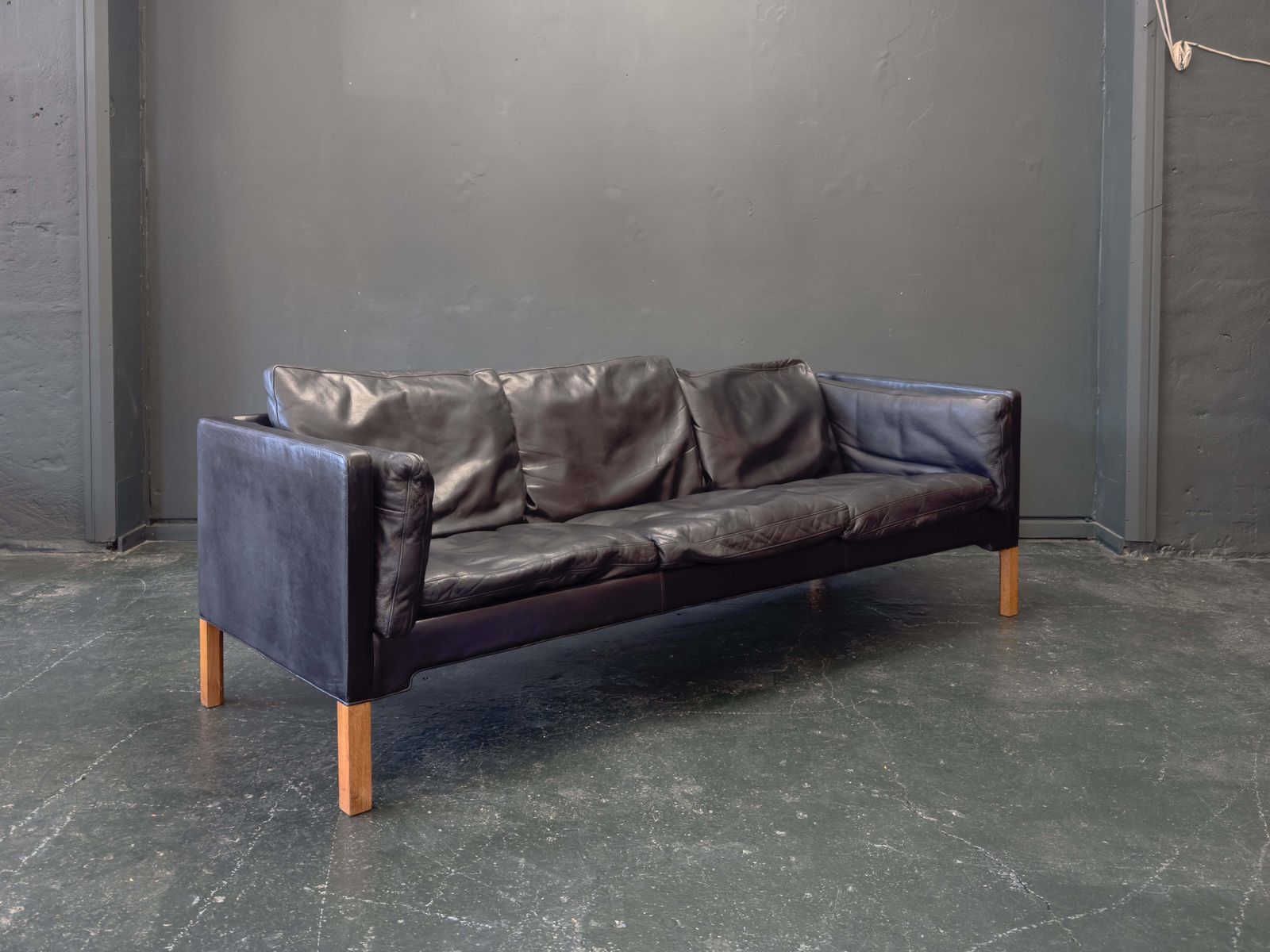 Black Leather Three Seater Sofa photo furniture