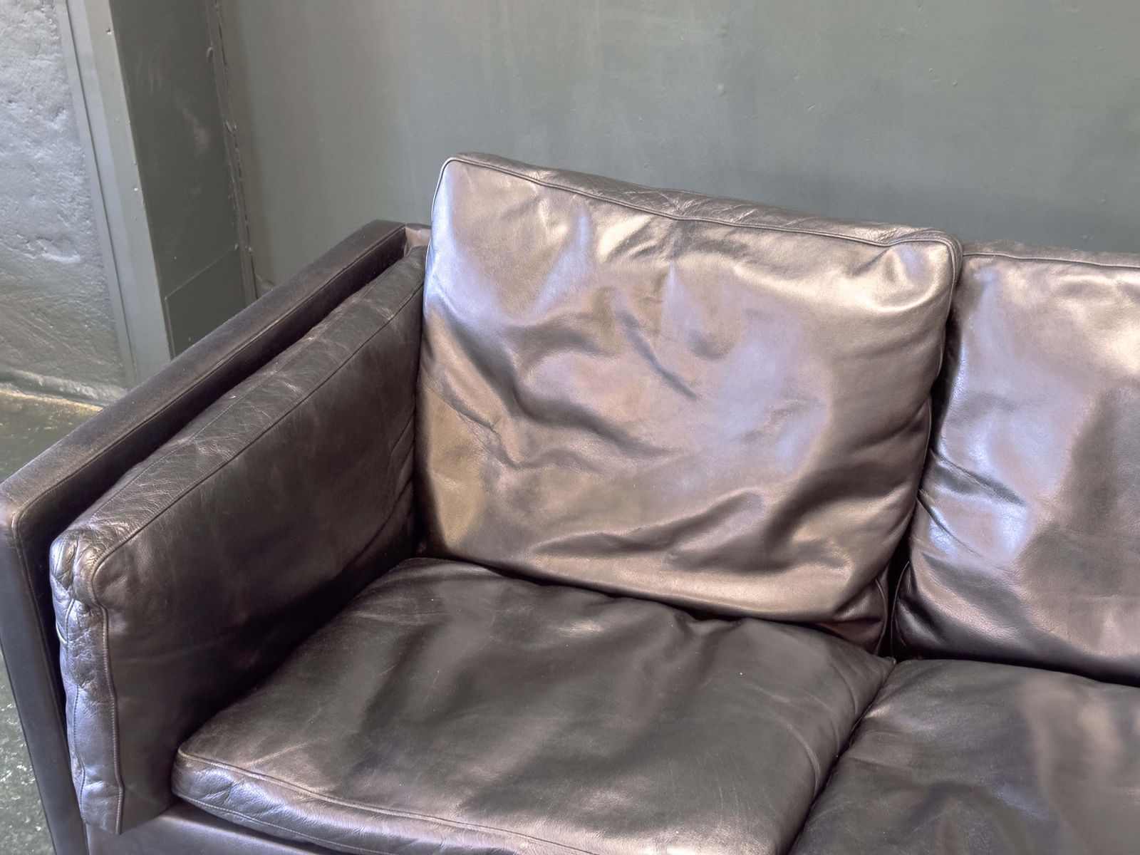 Black Leather Three Seater Sofa photo 1700.0