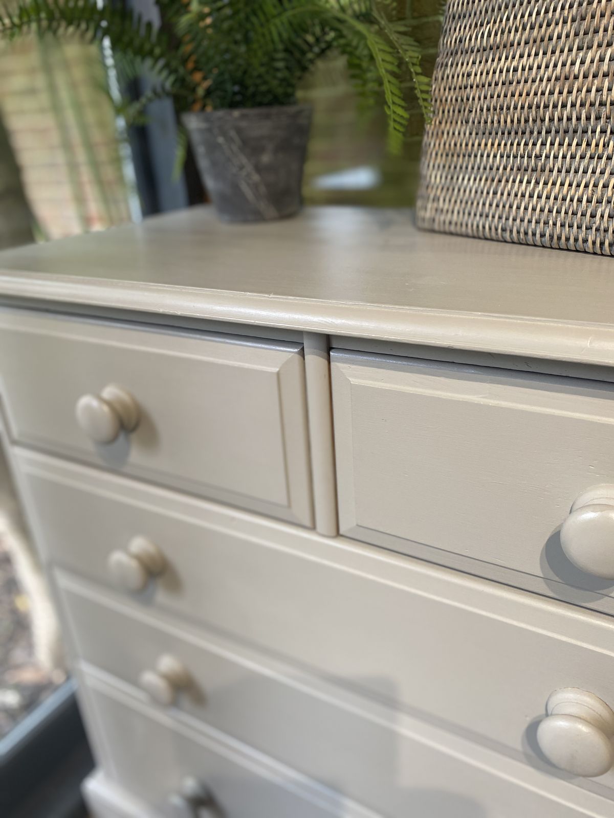A Compact Solid Chest Of Drawers Hand Painted In A Neutral photo furniture