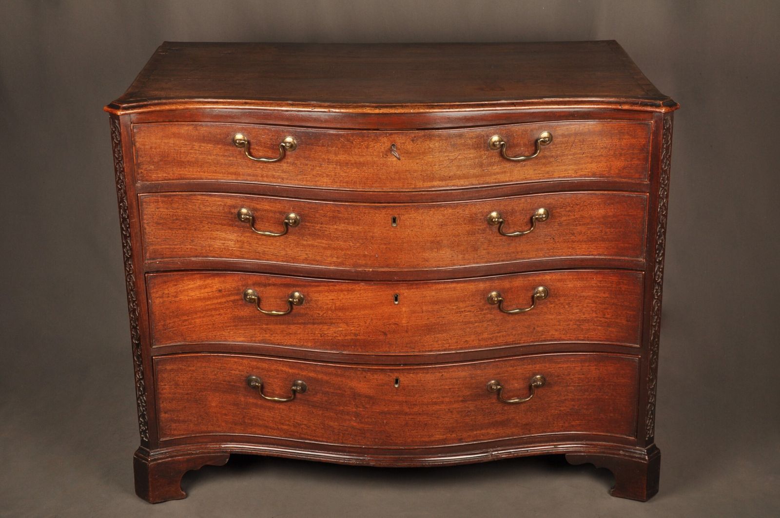 A Fine 18th Century Serpentine Chest Of Drawers photo Furniture