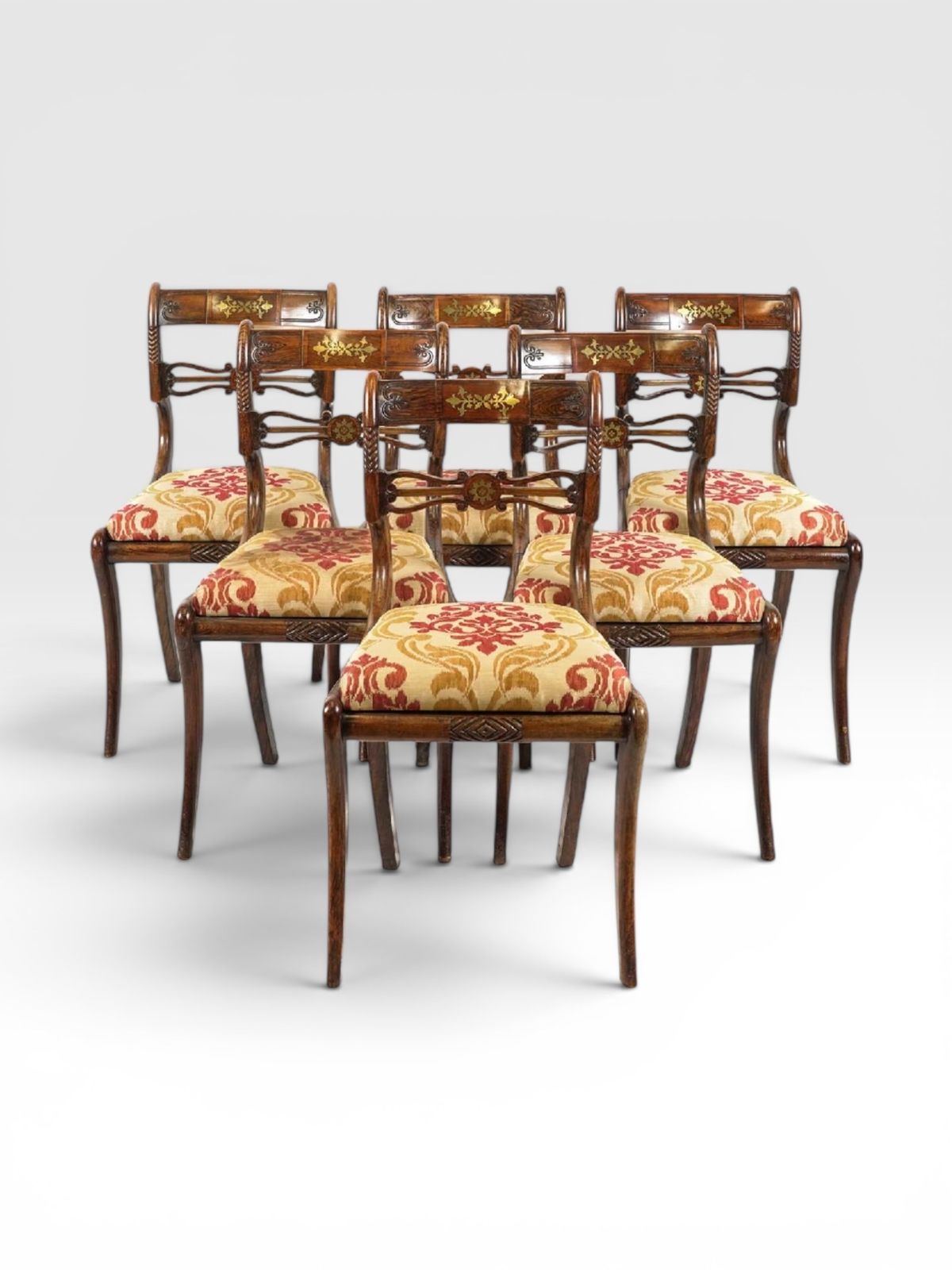A Set Of Six Regency Faux Rosewood Brass Inlay Dining Chairs