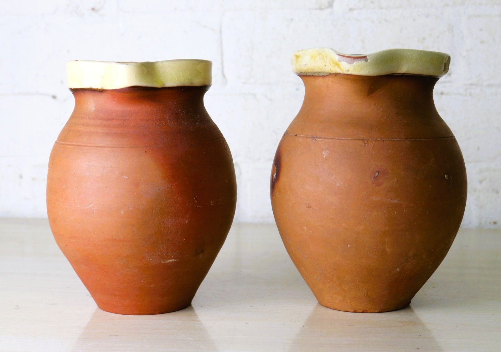 Two Antique 19th Century Jugs Terracotta Slip Glazed Internally With A Cream Rim photo for sale