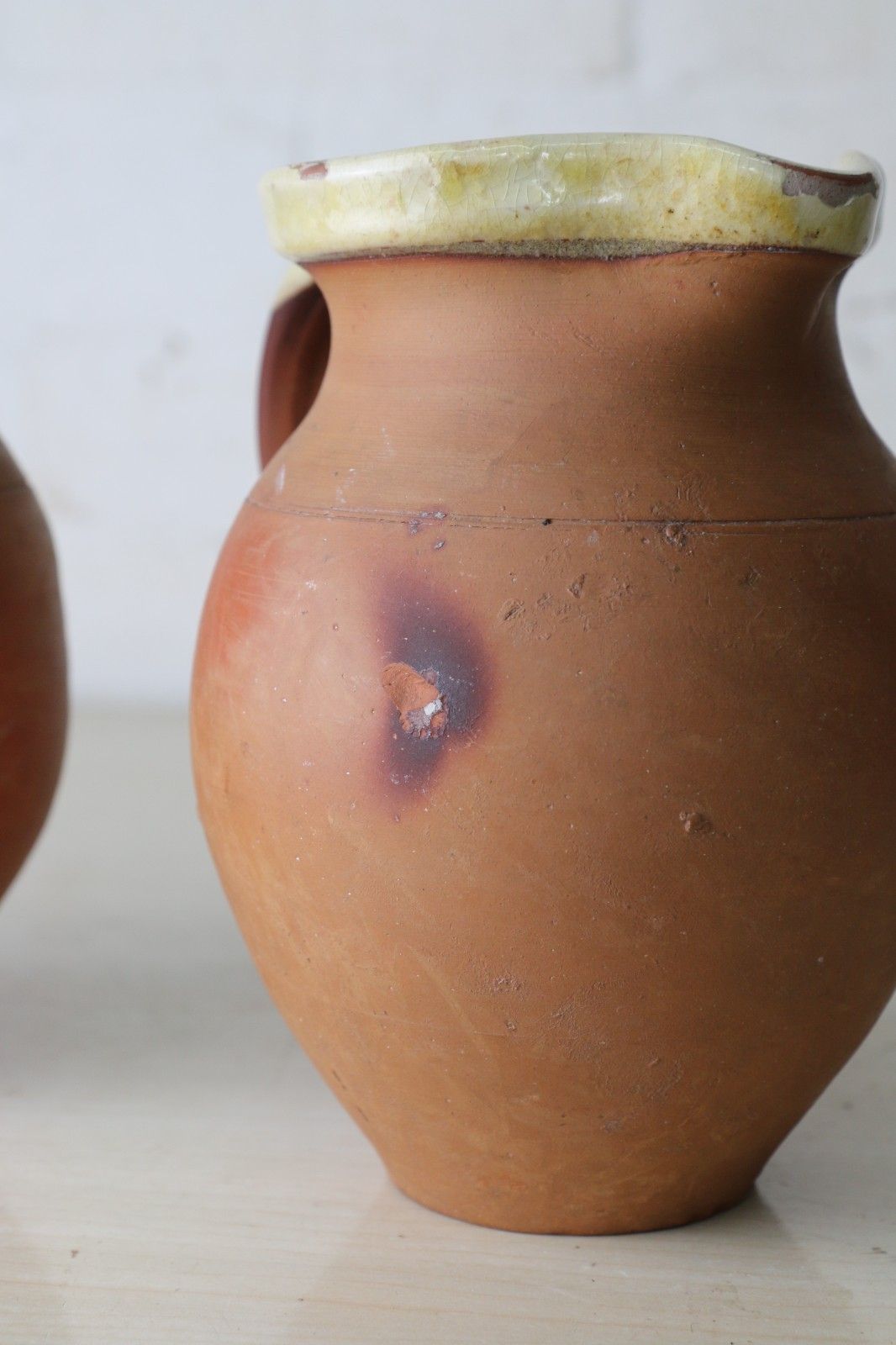 100.0 Two Antique 19th Century Jugs Terracotta Slip Glazed Internally With A Cream Rim photo
