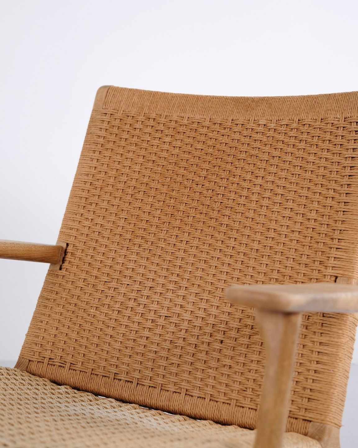 Ch25 Lounge Chair In Patinated Solid Oak And Woven Paper Cord By Hans J. Wegner photo for sale