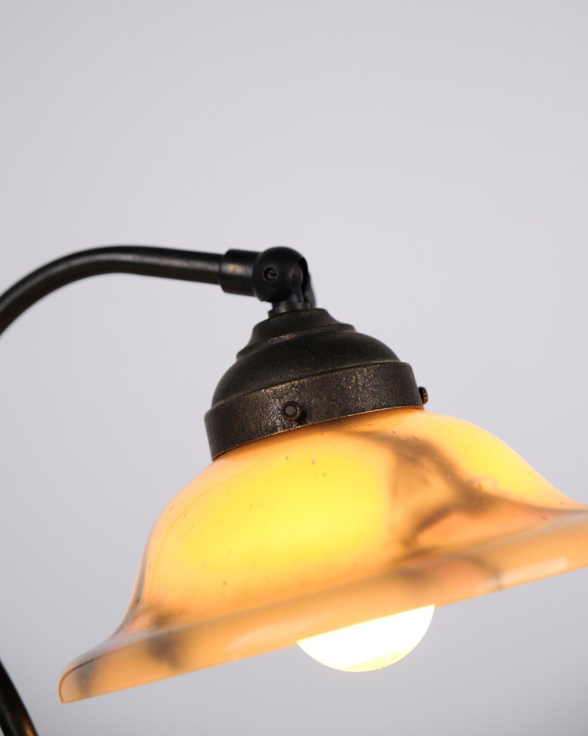 Antique Desk Lamp In Wrought Iron With Yellow Frosted Glass Shade In Art Nouveau Style photo for sale
