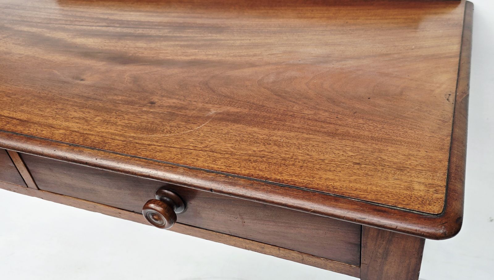 photo buy An Antique Mahogany Writing Desk On Turned Legs, 19th C.