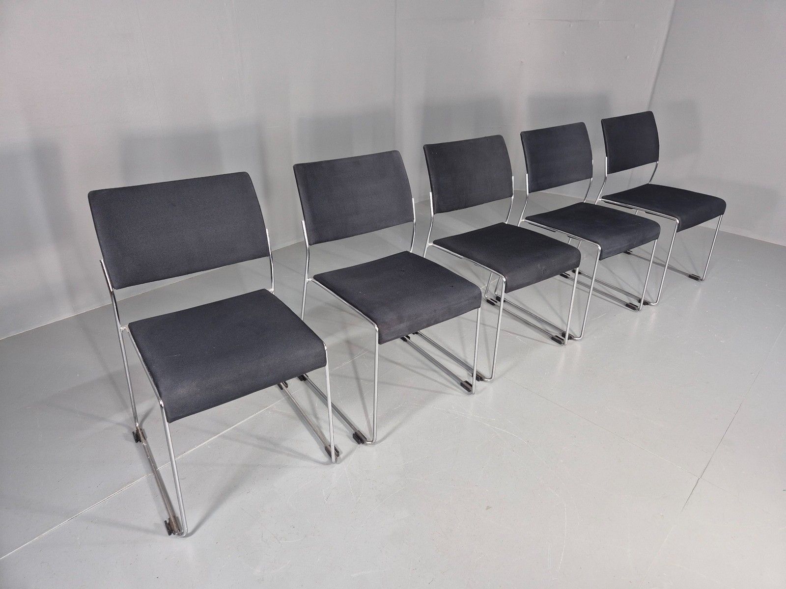 5 Vintage Stacking Chairs Chrome Rod And Black Cloth Brunner Brand Eb12003