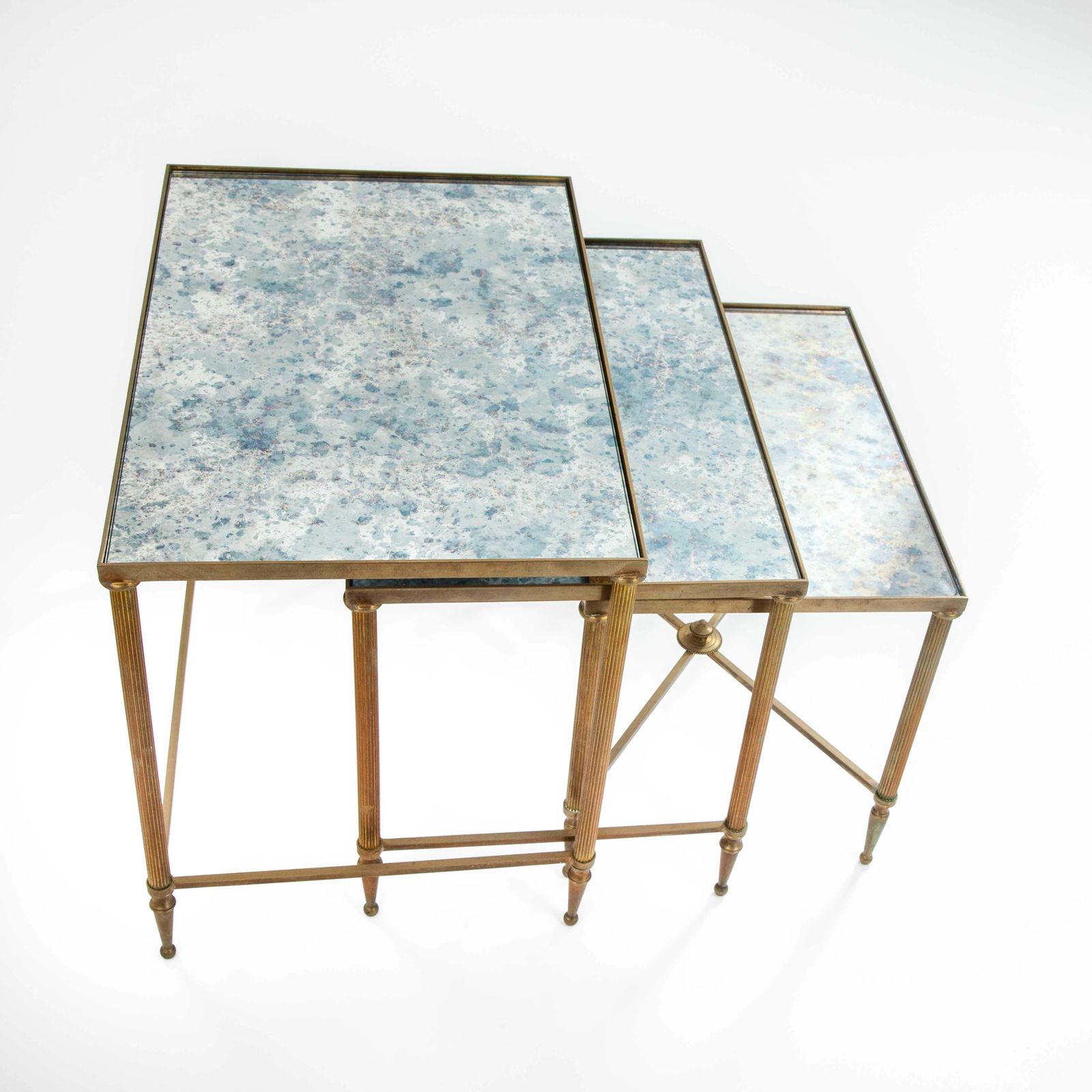photo for sale Set Of French Mid Centruy Neoclassical Brass And Mirrored Glass Nessting Tables