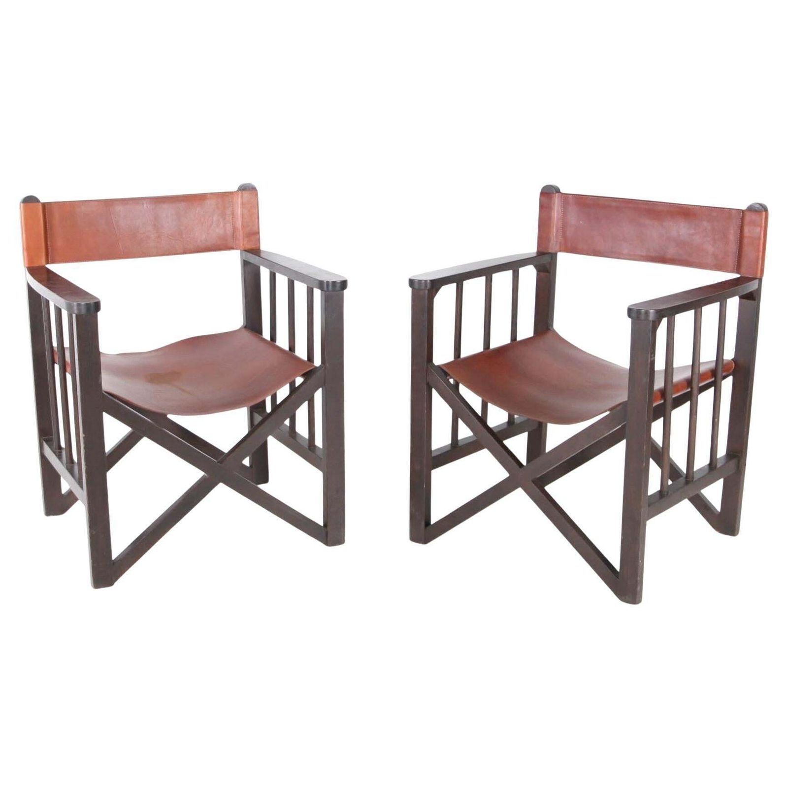 Pair Of Leather And Wood Armchairs