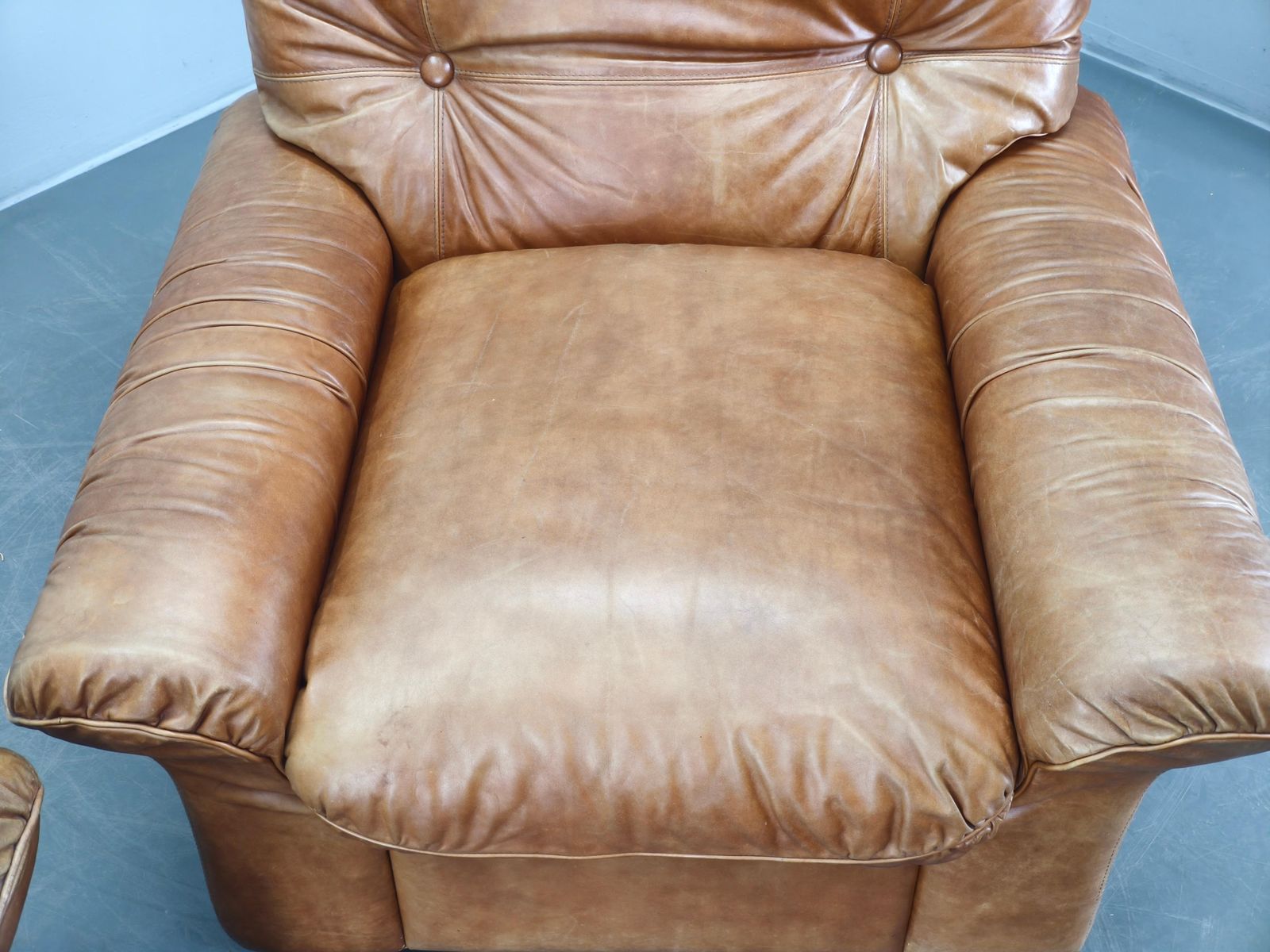 photo for sale Pair Of Arcon Italia Cognac Buffalo Leather Lounge Armchairs
