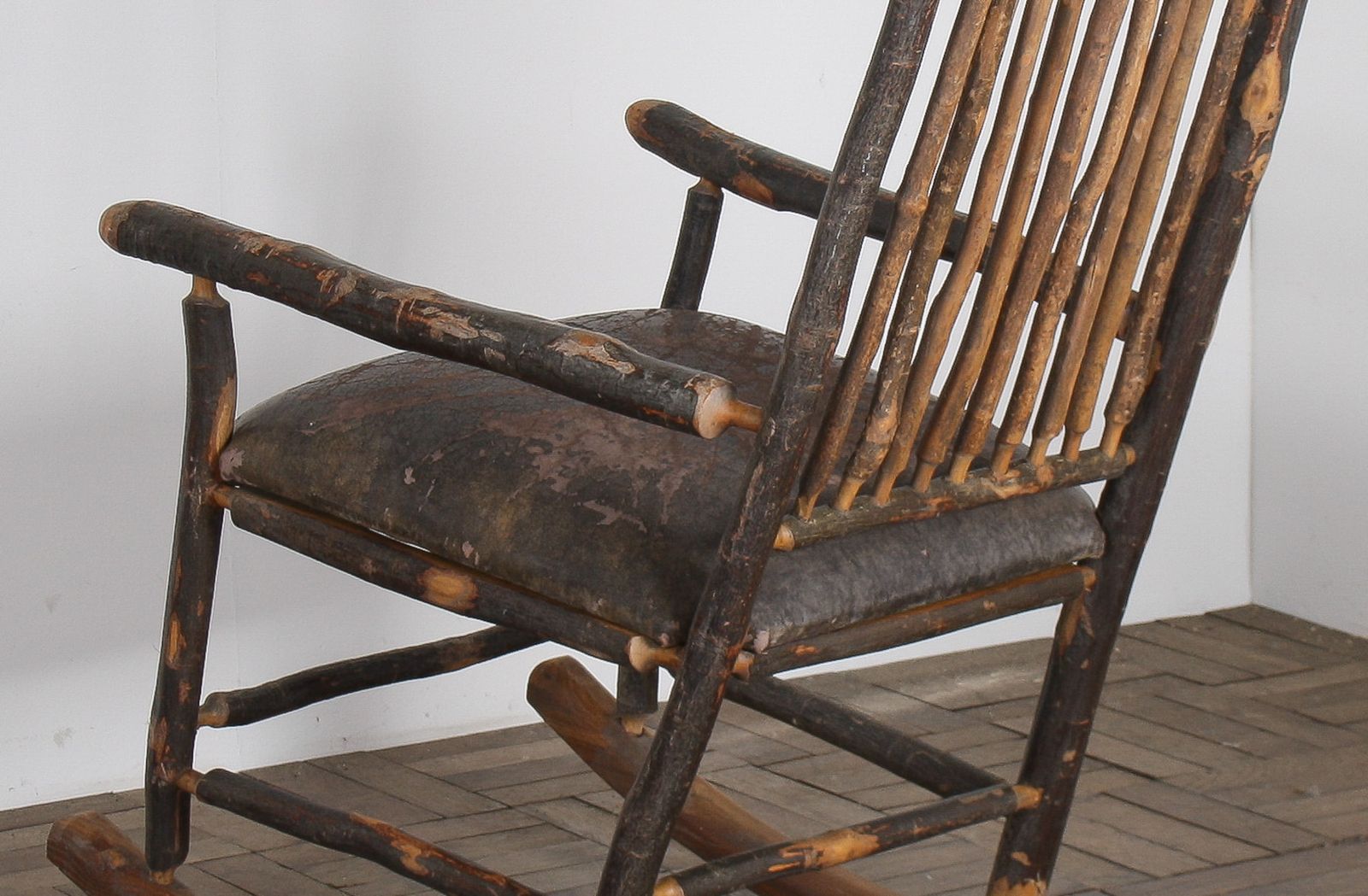 photo for sale Antique American Stick Back Rocking Chair With Distressed Patina And Leather Seat