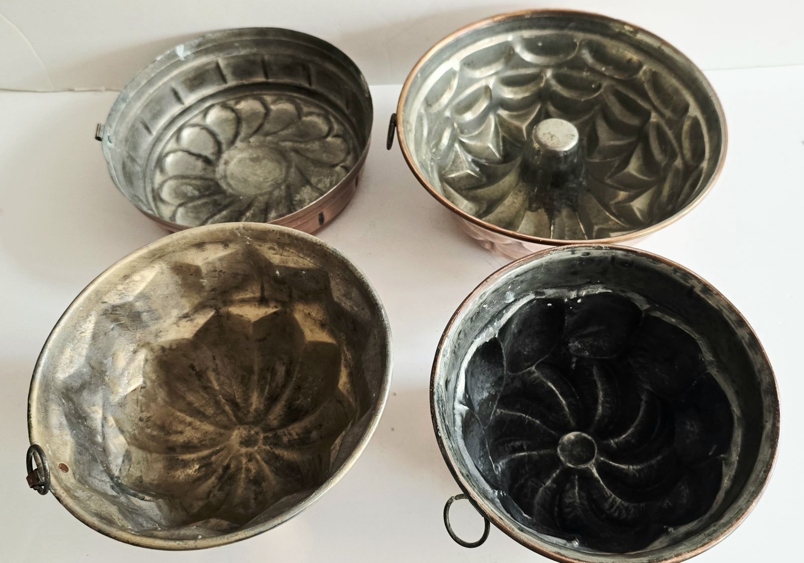 A Set Of Four Large Antique French Copper Cake Moulds, 19th Century. photo furniture