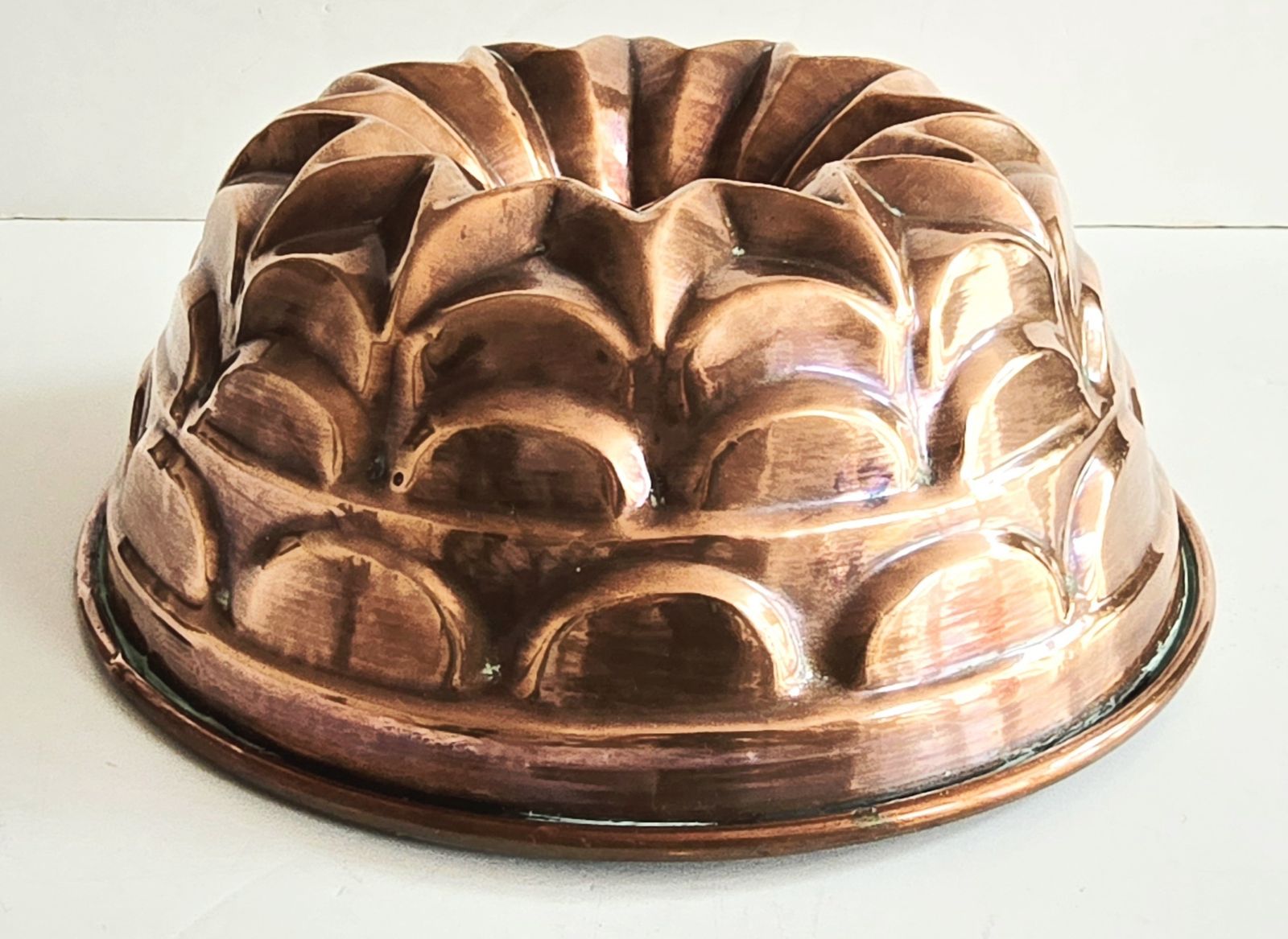 495.0 A Set Of Four Large Antique French Copper Cake Moulds, 19th Century. photo
