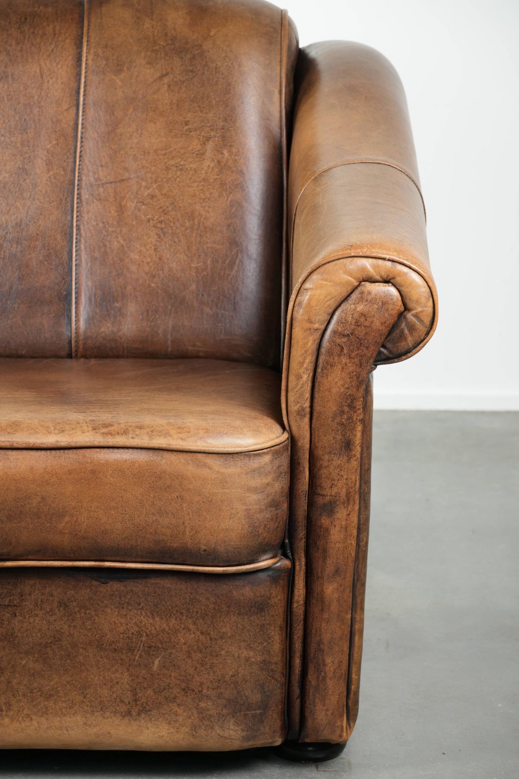 photo furniture Beautifully Designed And Comfortable Sheepskin Armchair With A Timeless Look And A Finish With Matching Piping.