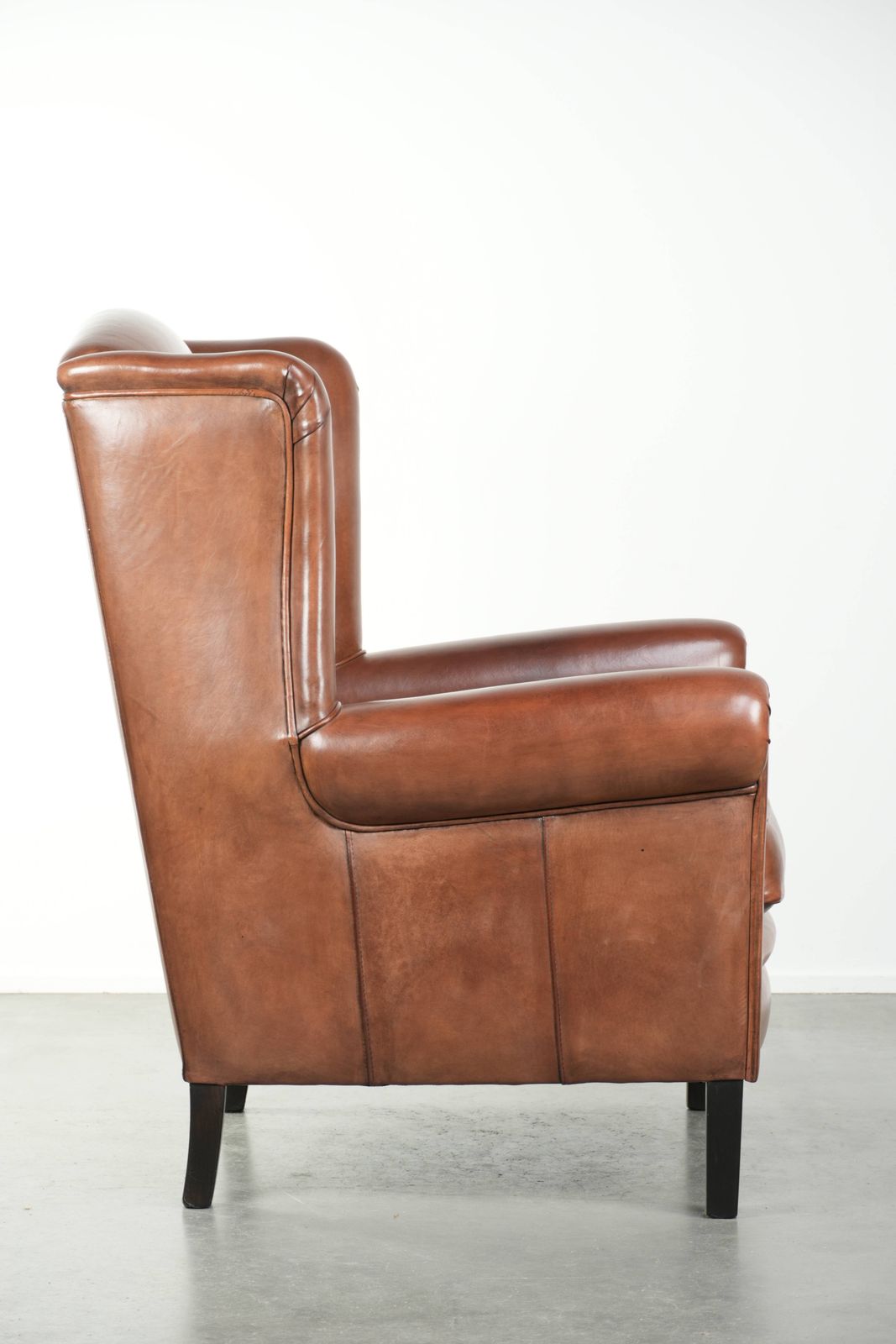 Large Sheepskin Wing Armchair In Like New Condition, In Timeless English Style, With Excellent Seating Comfort. photo for sale