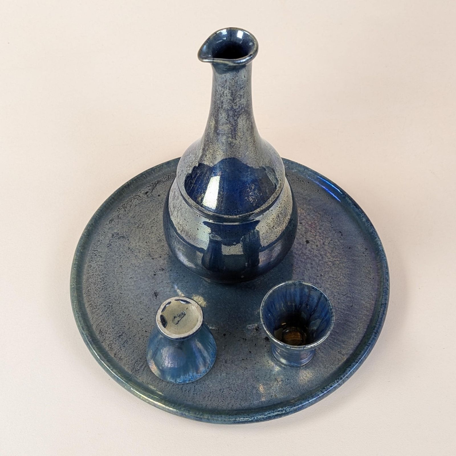 photo furniture Liqueur Set, Flamed Stoneware Rambervillers Alphonse Cytere Blue Luster Ceramic Carafe Cups Tray Art Deco
