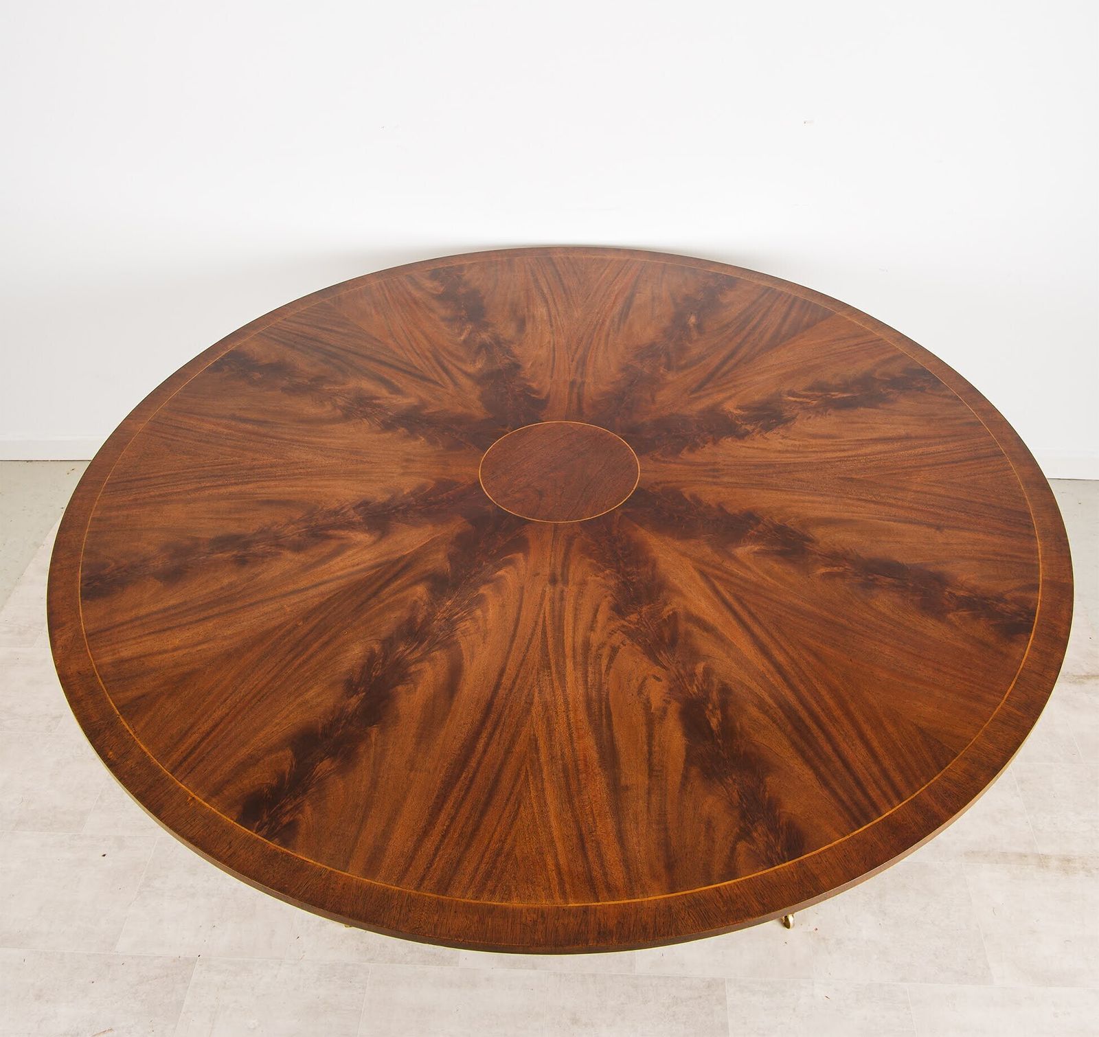 Large Regency Style Flame Mahogany Circular Dining Table With Brass Lion Paw Castors photo for sale