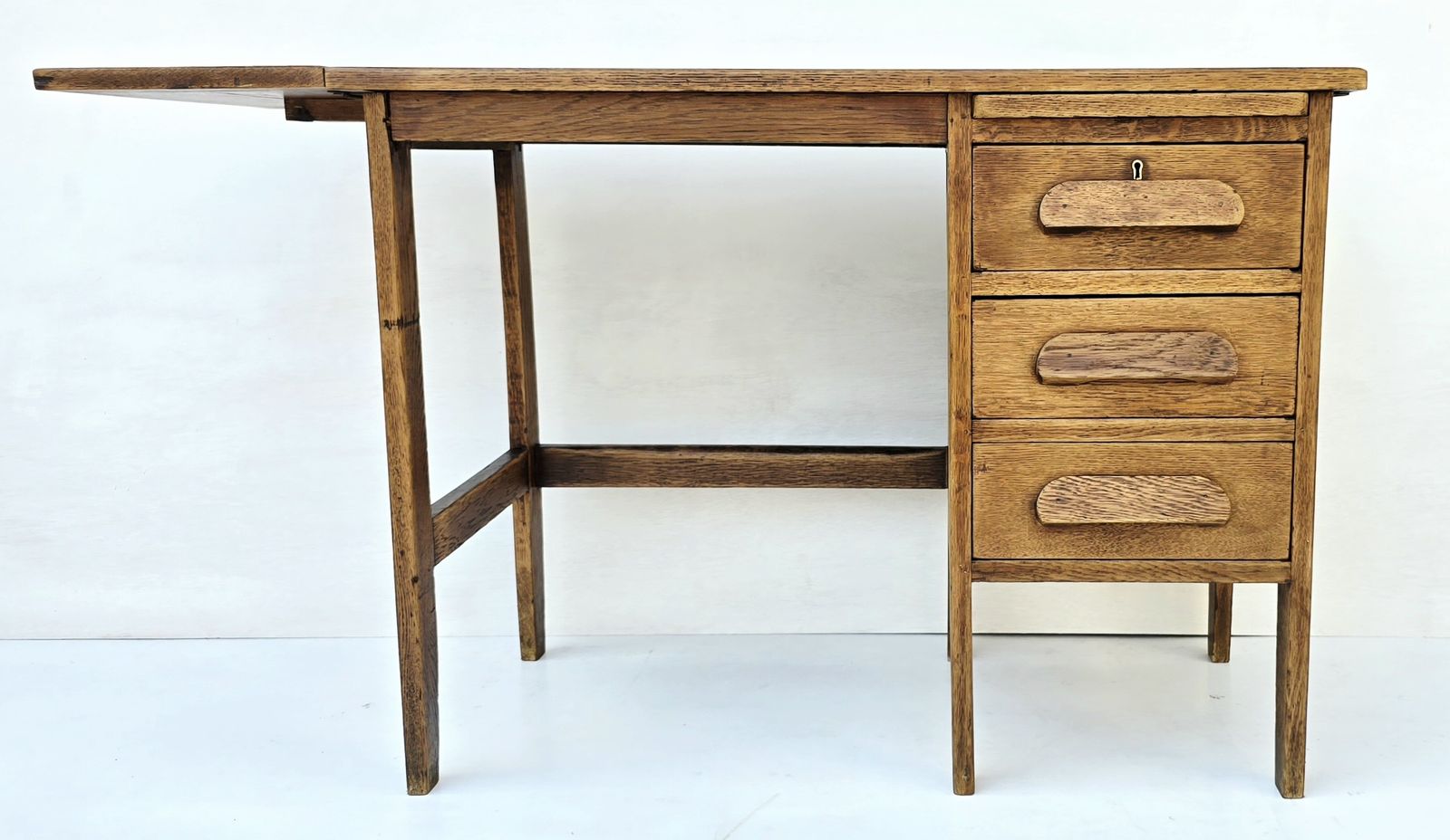 A Petite Mid Century Oak Drop Leaf Desk, Single Pedestal. photo furniture