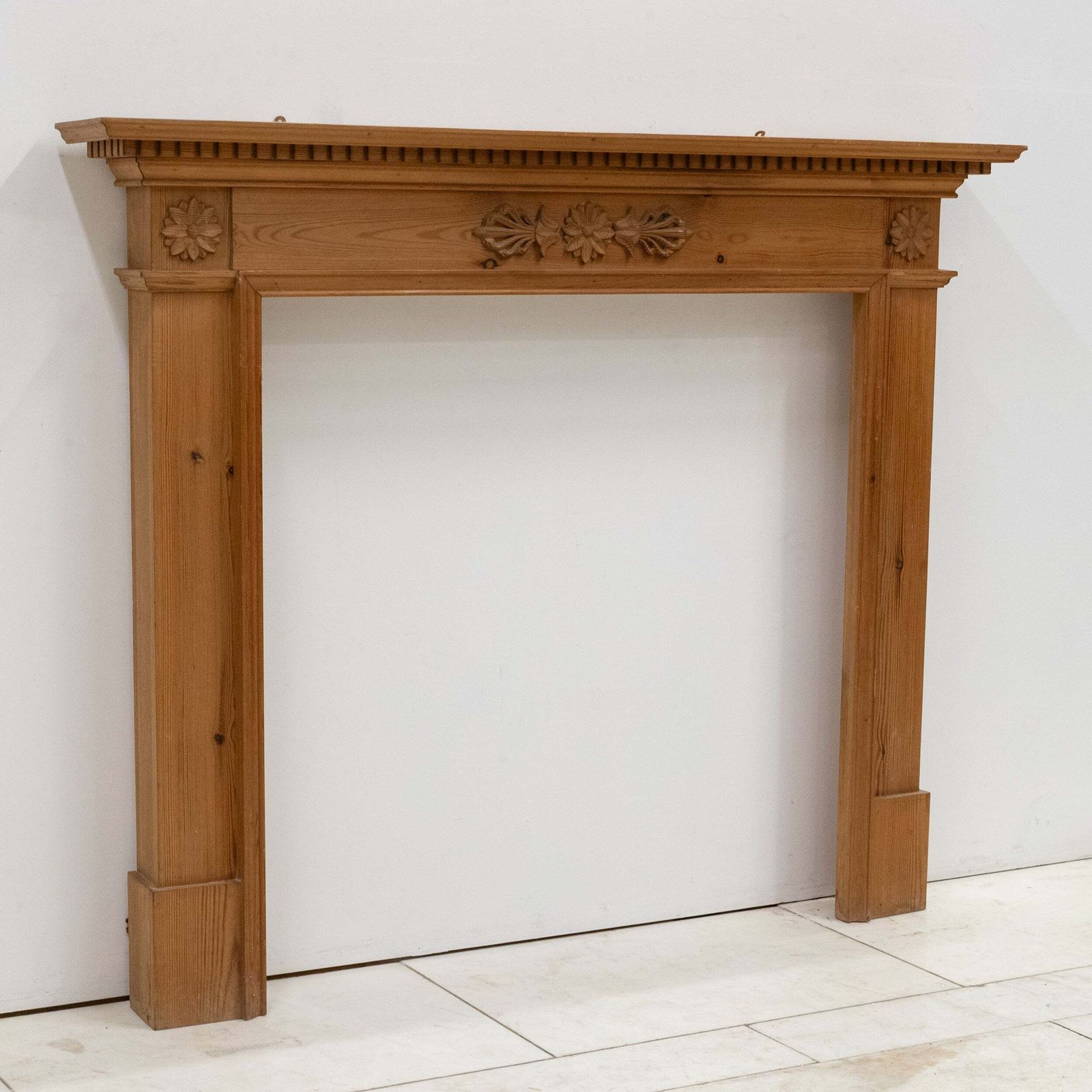 Antique Wooden Fireplace Surround With Flowers photo vintage