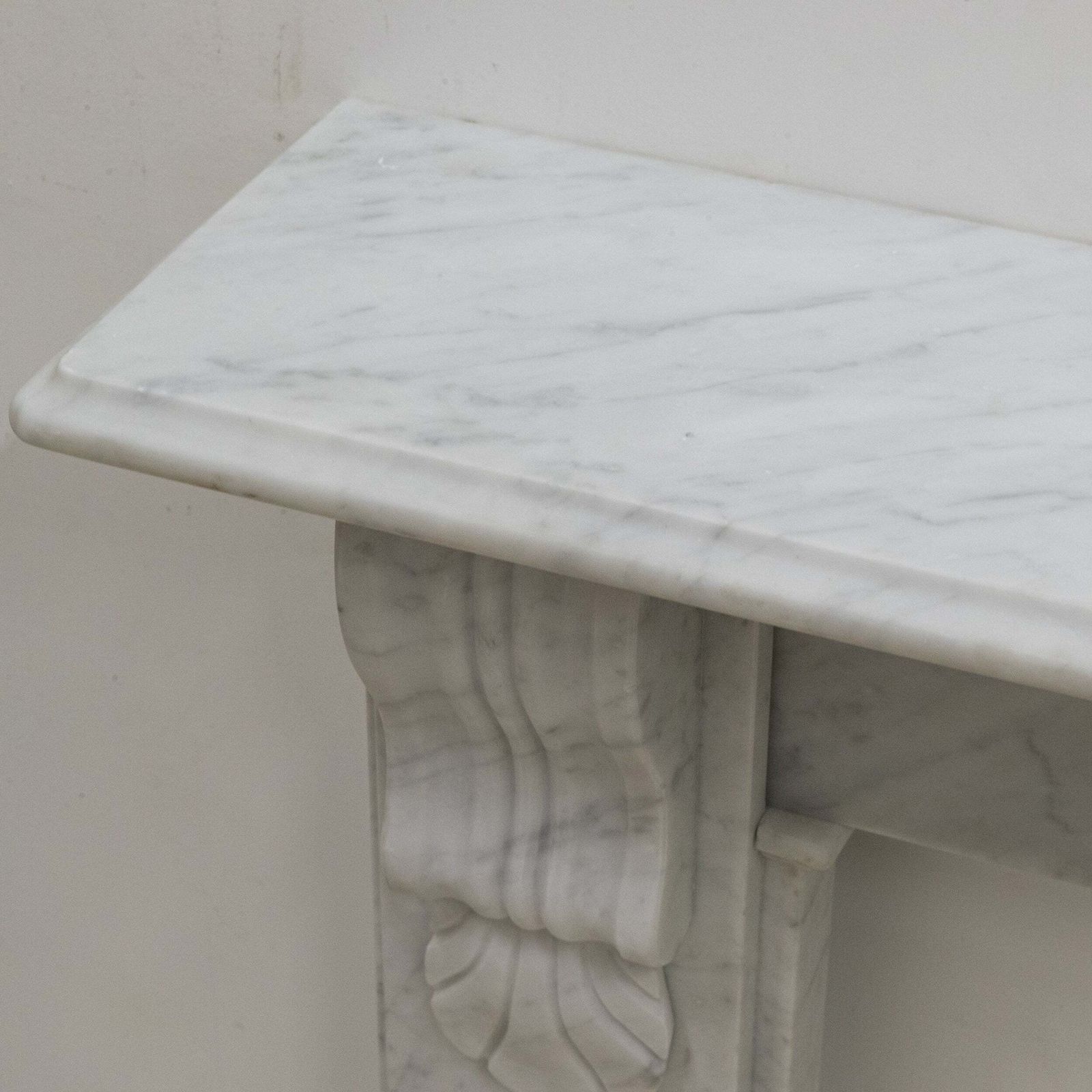 photo vinterior Victorian Style Carrara Marble Fireplace Surround With Corbels