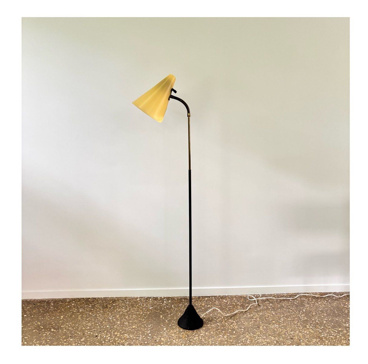 Mid Century Floor Lamp In Black Metal And Brass With Yellow Shade, Sweden, 1950s