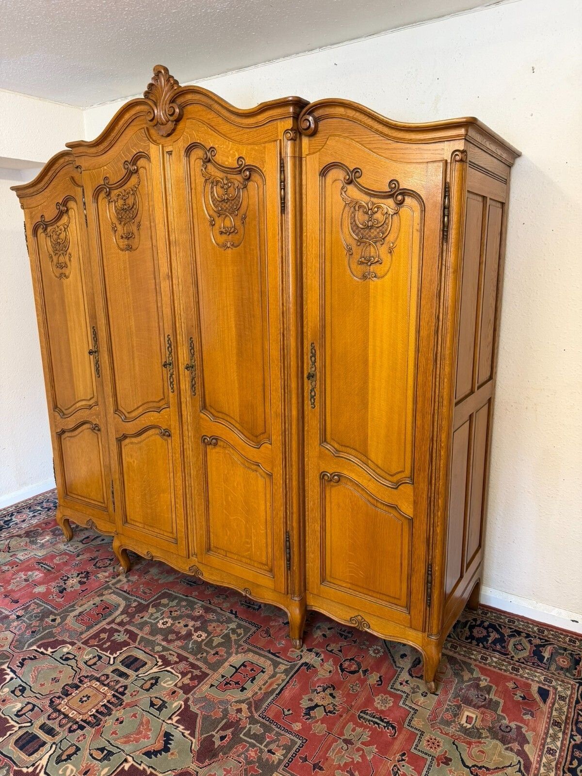 Quality French Carved Oak Four Door Brake Front Armoire/Wardrobe Circa 1950 photo for sale
