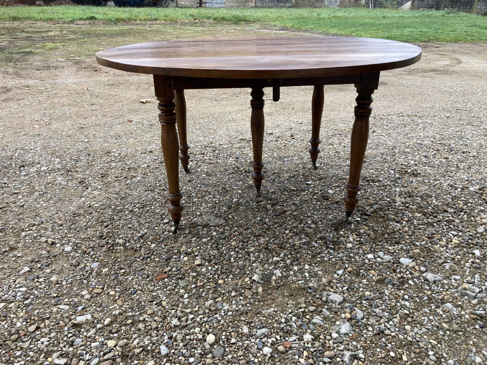 260.0 Page 1 Of 13 Round Walnut Table Of 130 Cm In Diameter. photo