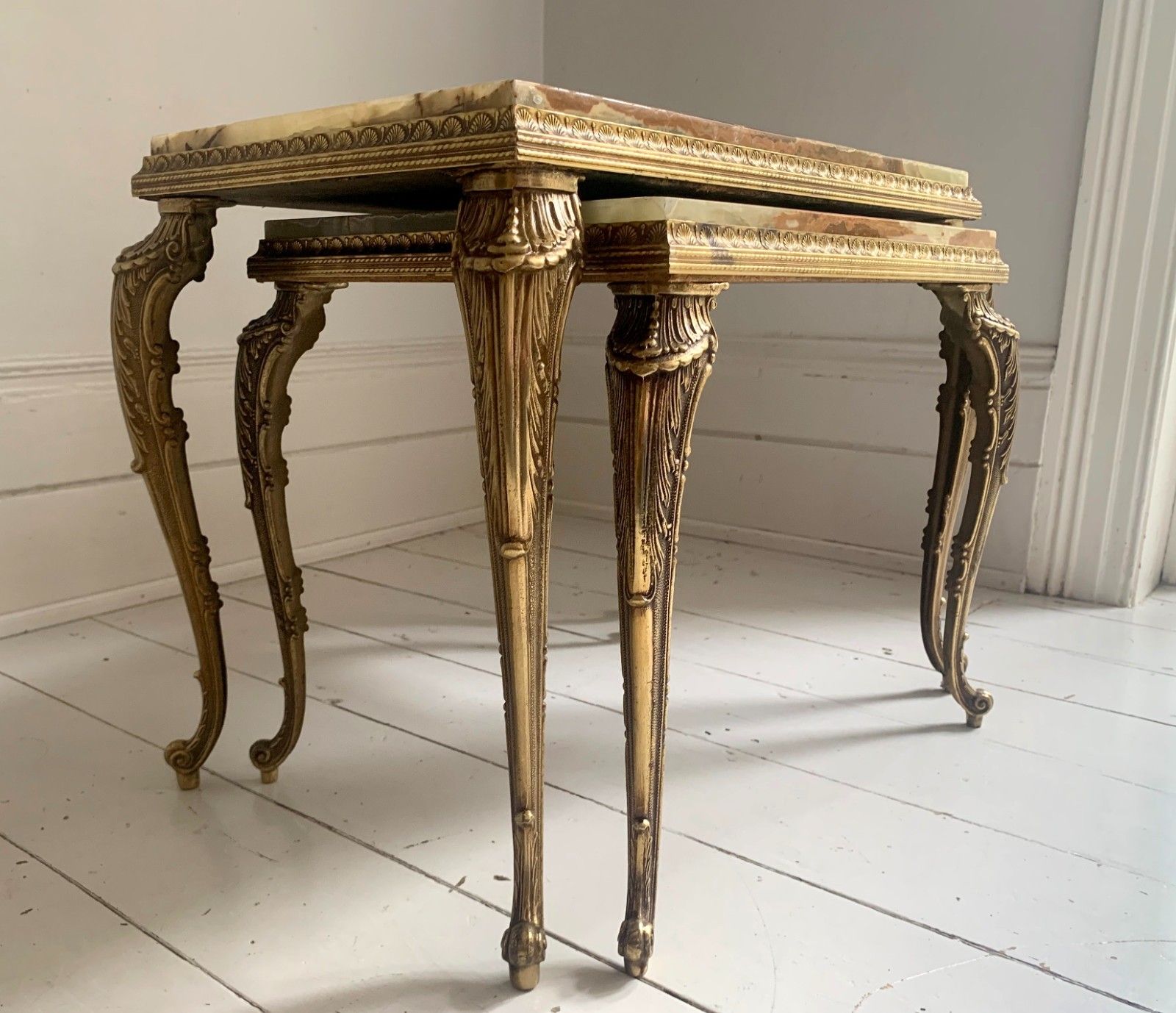 photo for sale Vintage Hollywood Regency Pair Of Onyx & Brass Nesting Tables