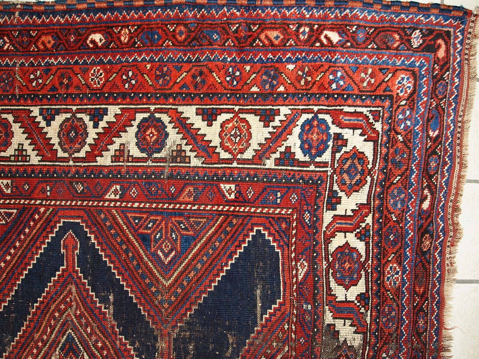 Handmade Antique Distressed Tribal Wool Rug — 4'9" × 11'2" — 1900s photo for sale