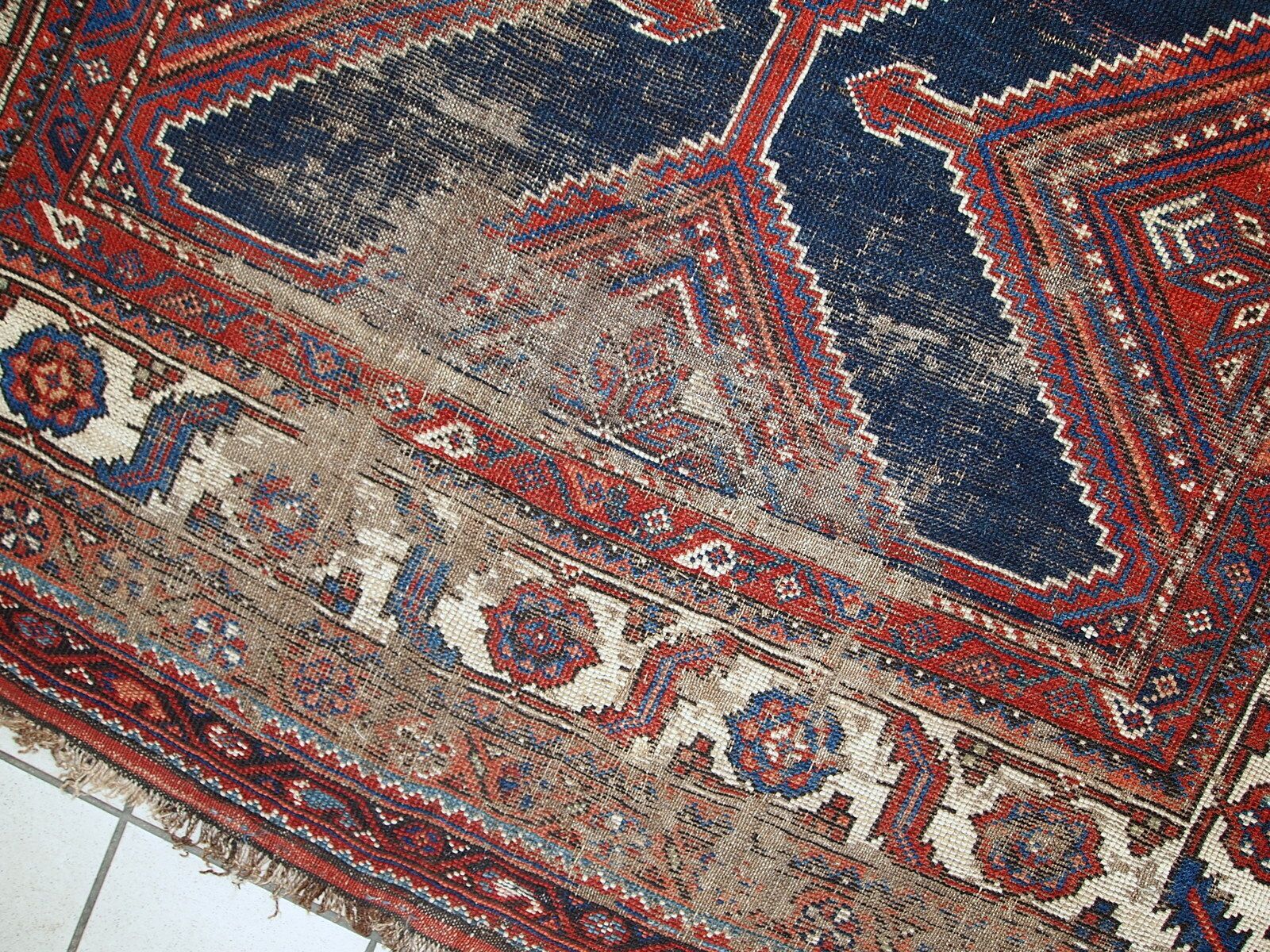 Handmade Antique Distressed Tribal Wool Rug — 4'9" × 11'2" — 1900s photo vinterior