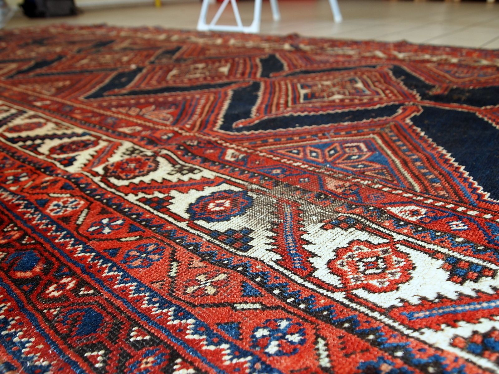 photo vintage Handmade Antique Distressed Tribal Wool Rug — 4'9" × 11'2" — 1900s