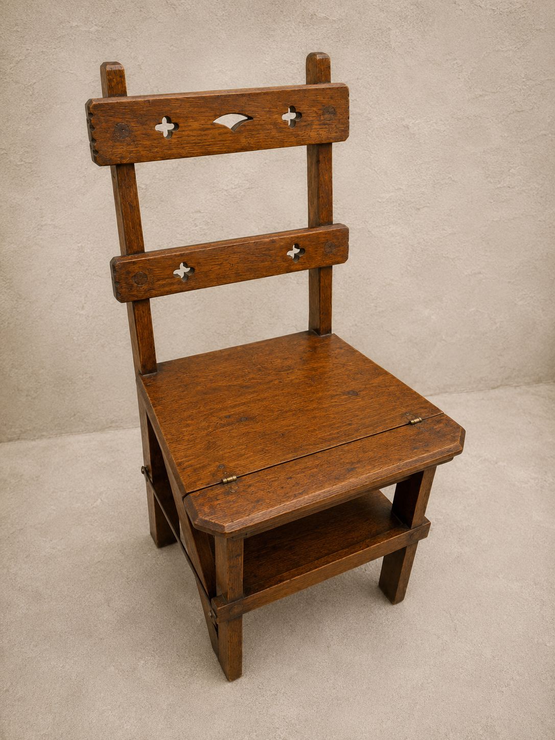 photo furniture A Late Victorian Arts & Crafts Oak Metamorphic Library Chair, C.1890–1910, With