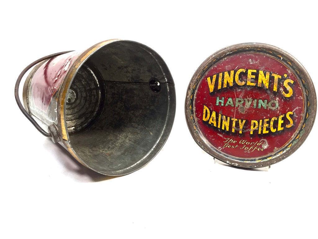 199.0 Antique Advertising 1920s Vincents Harvino Dainty Pieces Toffee Tin Bucket Shape photo
