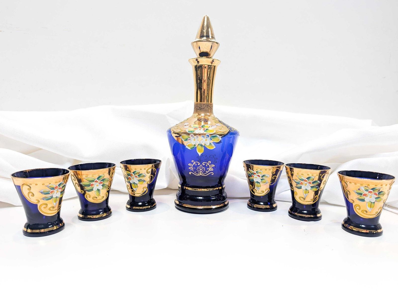 Murano Mid Century Cobalt Blue Glass Decanter And Six Liqueur/Shot Glasses. All Pieces Feature 24 Karat Gold Decoration And Hand Painted.