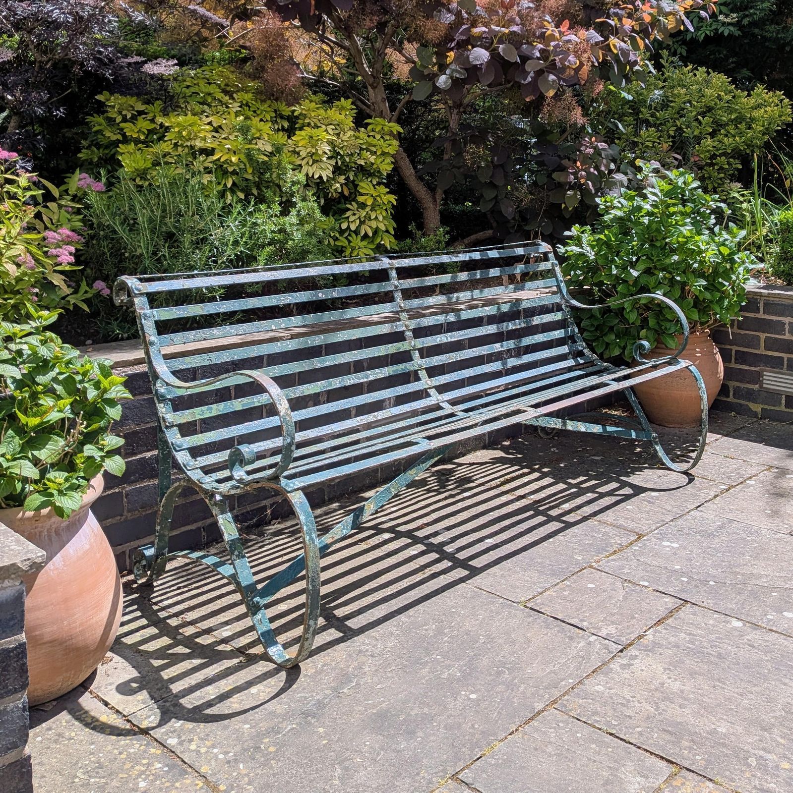 An Antique Regency Strapwork Iron Garden Bench C1830
