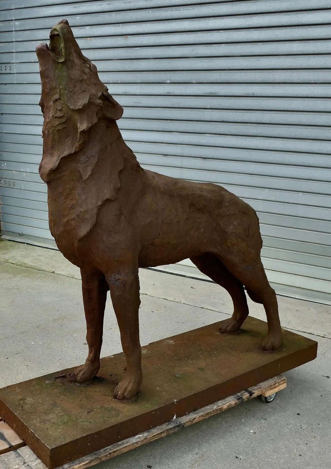Cast Iron Statue Of A Huge Howling Wolf A Handsome If Terrifying Beast photo Garden Decor