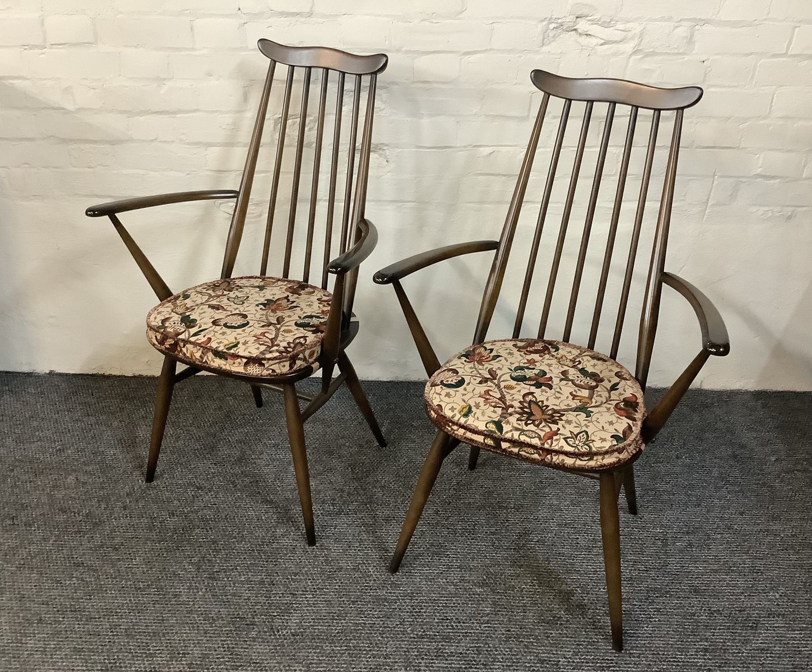 Pair Of Ercol Windsor Goldsmiths Carver Chairs.