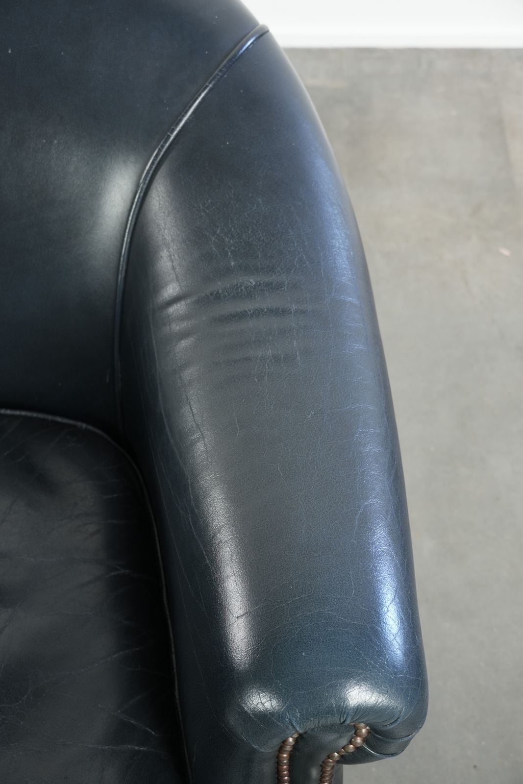 photo furniture Beautiful And Comfortable Set Of Dark Blue Cowhide Club Armchairs With A Unique And Timeless Design