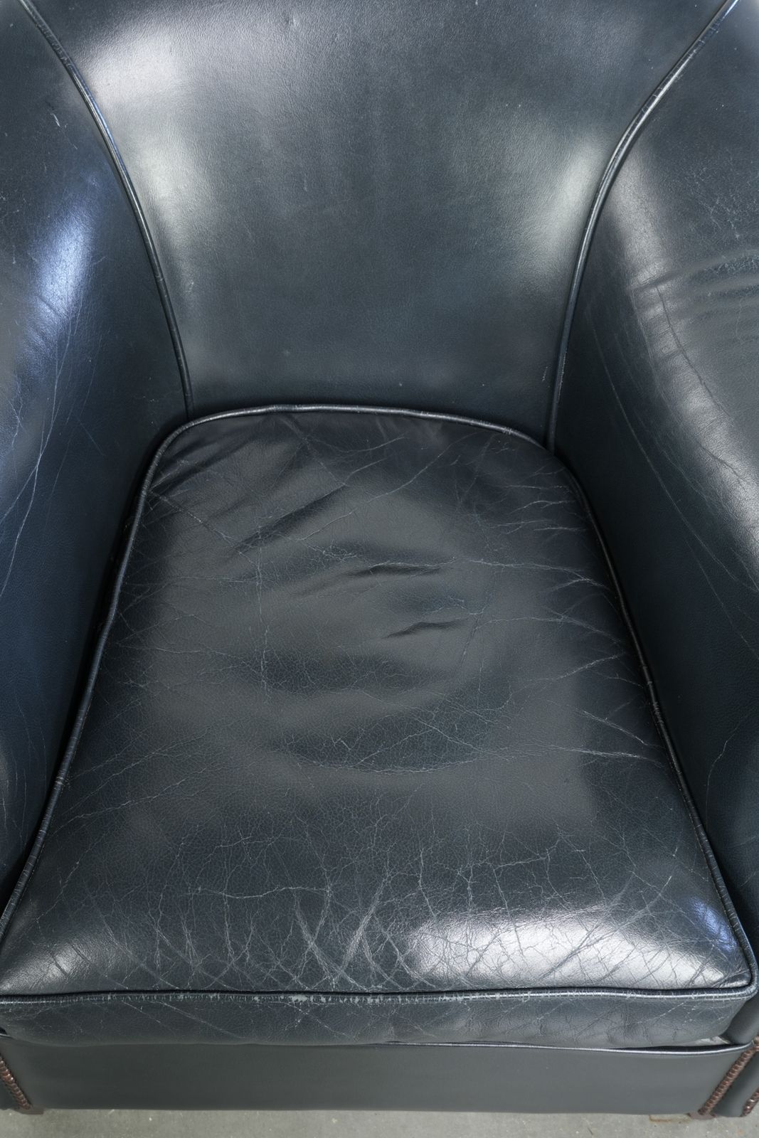 Beautiful And Comfortable Dark Blue Cowhide Leather Club Armchair With A Unique And Timeless Design photo vinterior