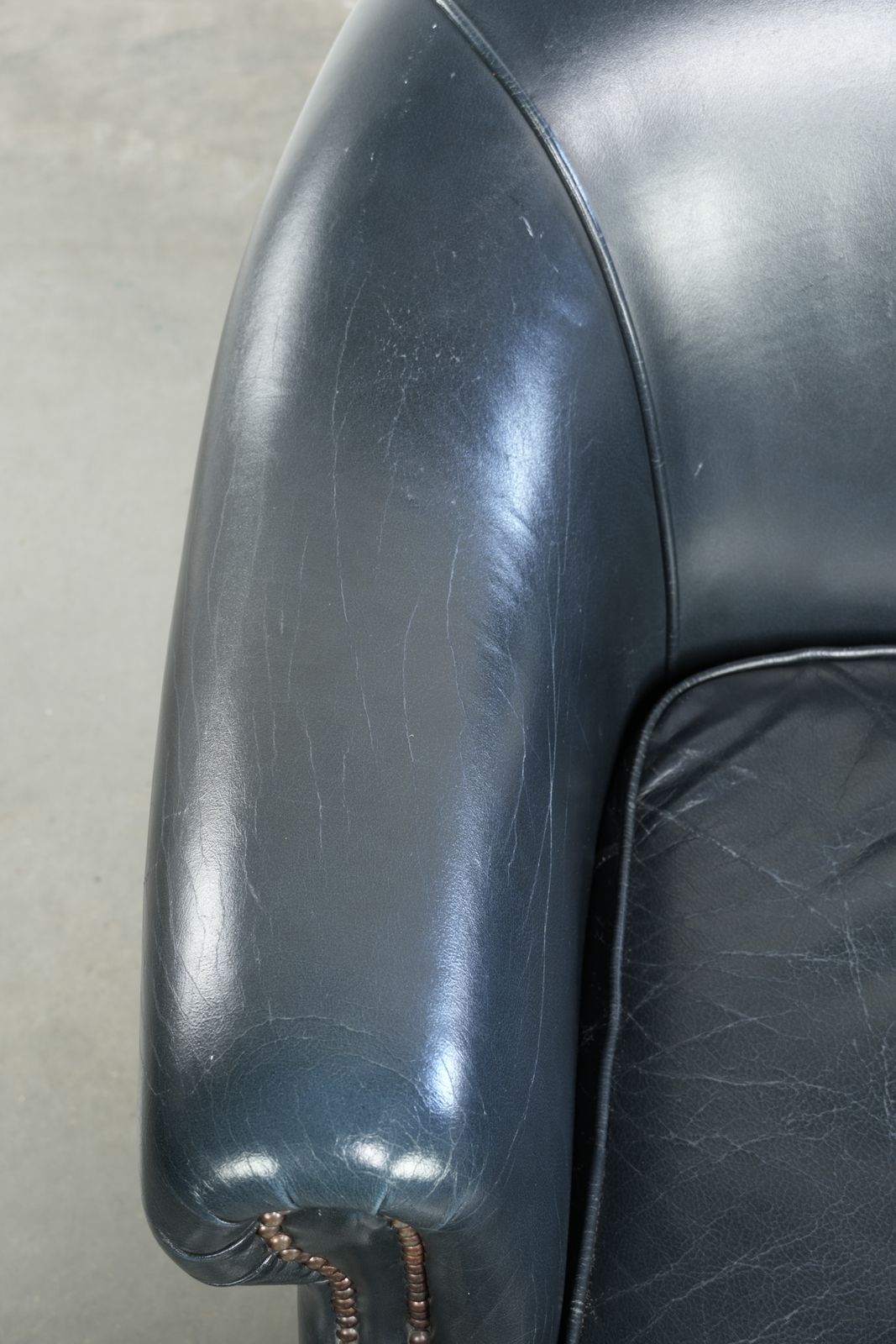 Beautiful And Comfortable Dark Blue Cowhide Leather Club Armchair With A Unique And Timeless Design photo buy