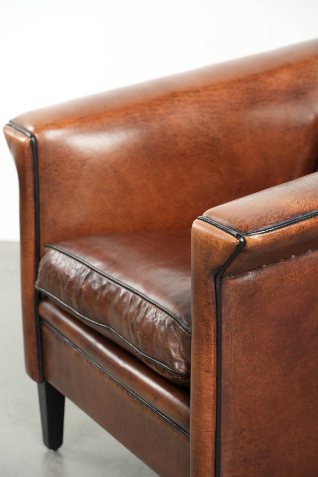 Furniture Beautiful, Sleek Art Deco Design Armchair/Lounge Chair In Sheepskin With Black Piping And A Gorgeous Warm Color. photo
