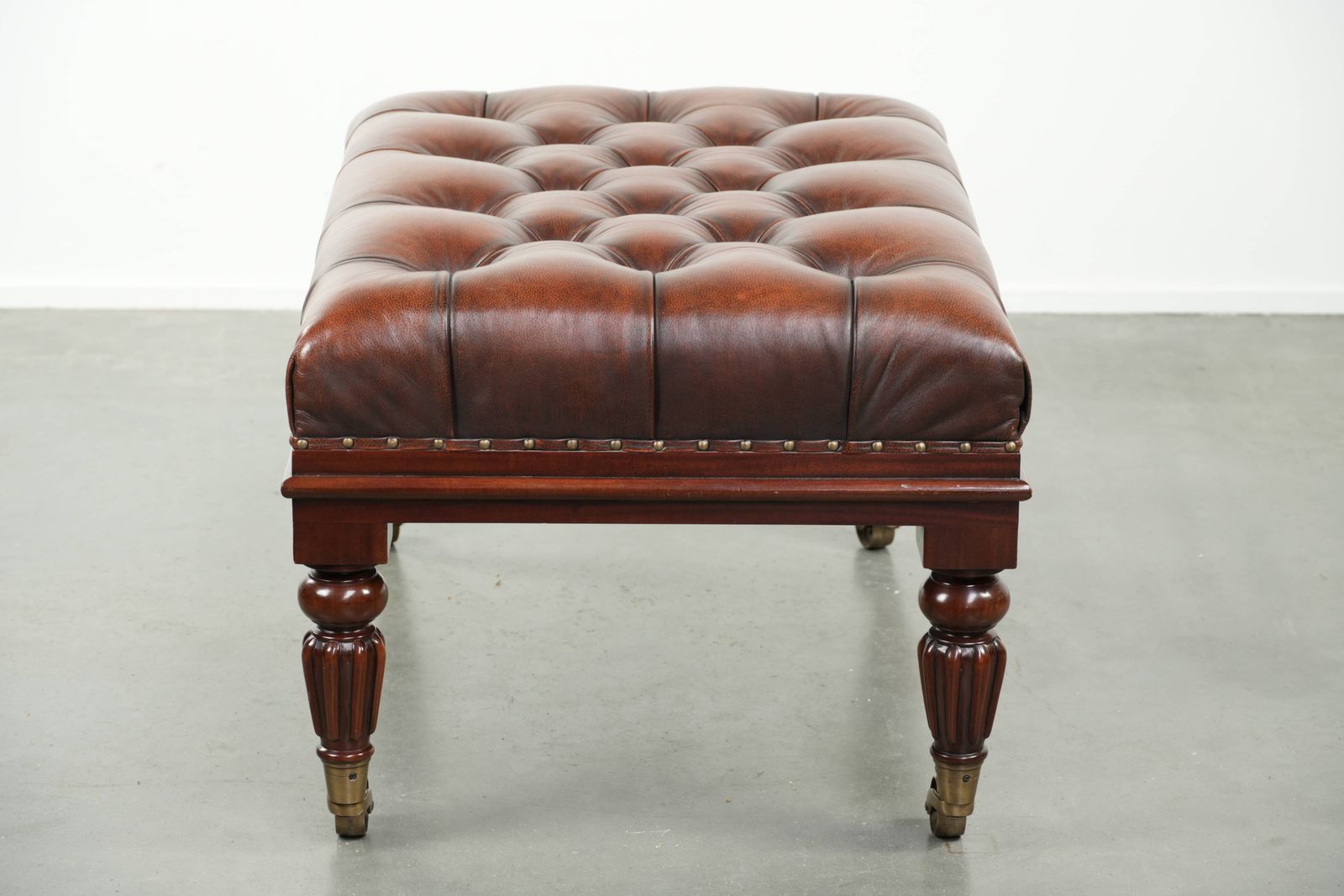 Large Brown Cowhide Chesterfield Ottoman In English Style With Elegant Legs And Brass Casters photo 619.0