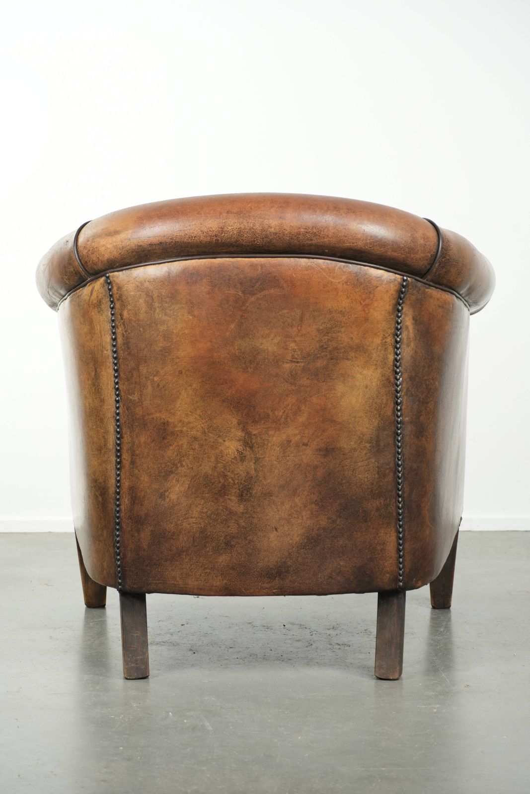 Characterful And Comfortable Sheepskin Club Armchair With A Beautiful Patina And A Refined Finish With Black Piping. photo Furniture